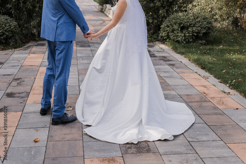 groom with bride together autumn park at wedding groom with bride together autumn park at wedding