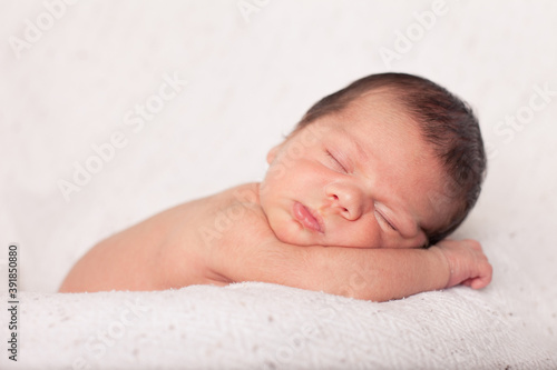 Newborn Baby Sleeping Peacefully at Home, Color Portrait