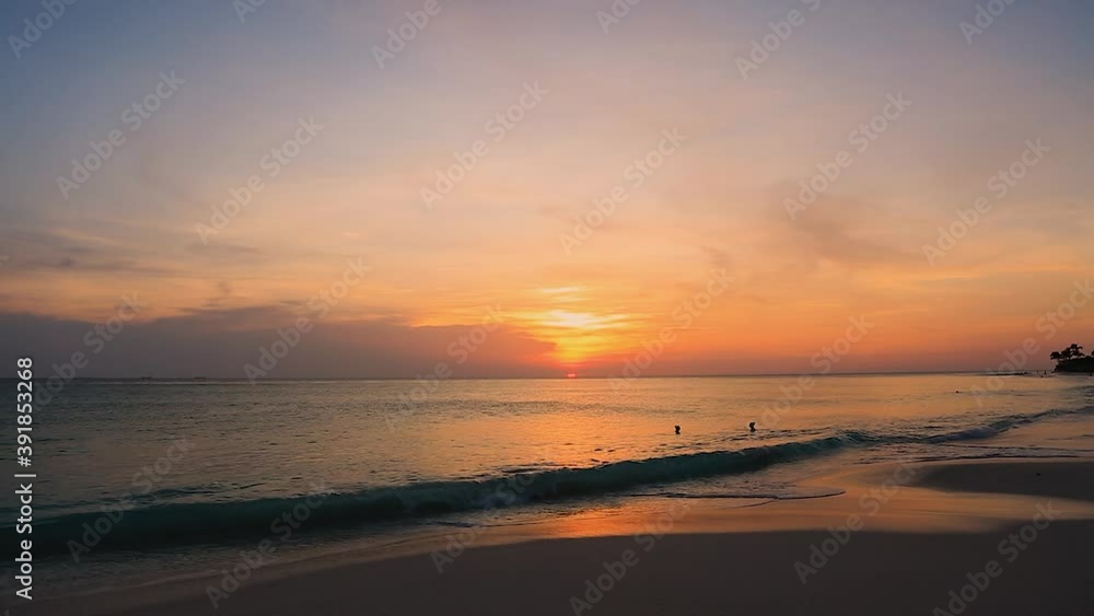 Amazing sunset on Eagle Beach of Aruba Island. Caribbean. Beautiful nature background.