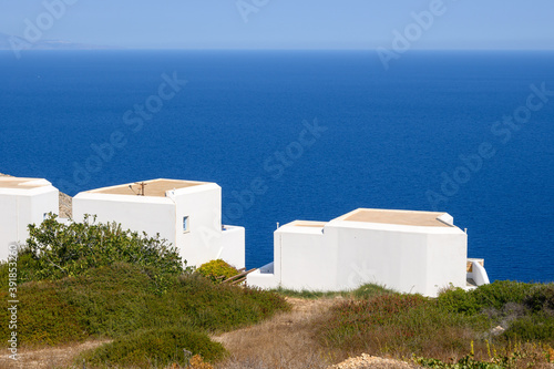 Holiday Greek villas with sea view on coast of Folegandros Island in Chora town. Cyclades, Greece © vivoo