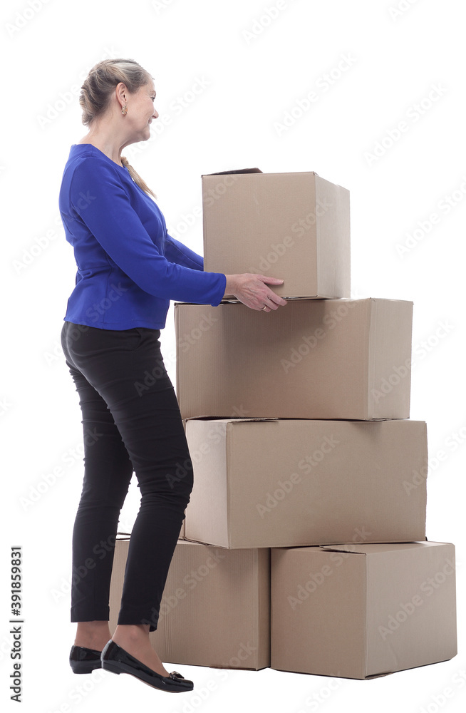 large cardboard box in the hands of a smiling woman. large cardboard box in the hands of a smiling woman.