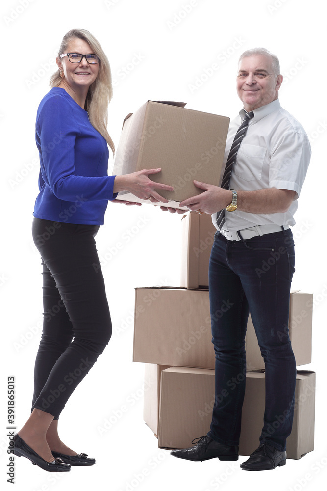 in full growth. smiling woman receiving boxes with her belongings. in full growth. smiling woman receiving boxes with her belongings.