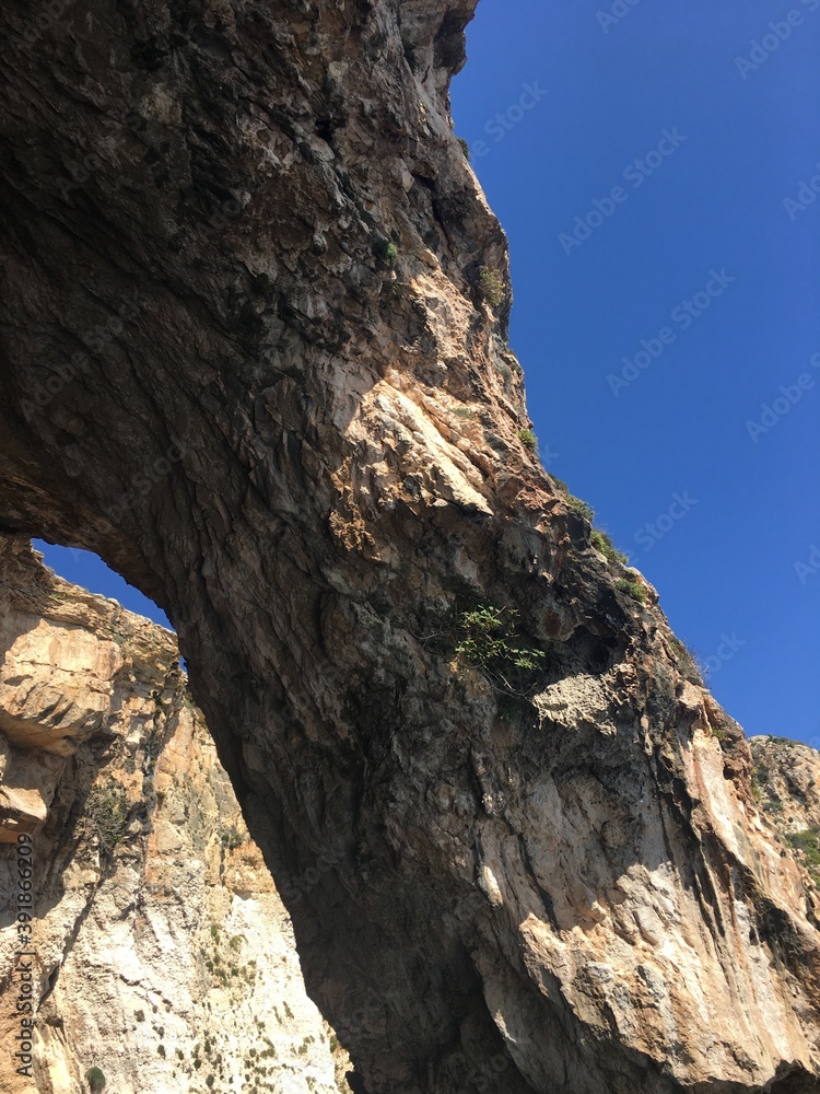 Steep cliff leading to Mediterranean Sea