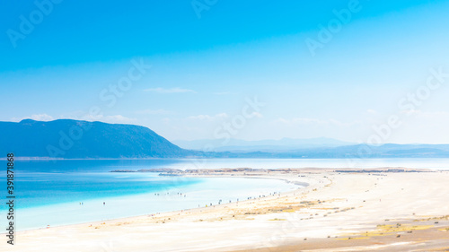 Fototapeta Naklejka Na Ścianę i Meble -  Aerial view over the clear beach and turquoise water of Salda lake. Burdur Province, Turkey
