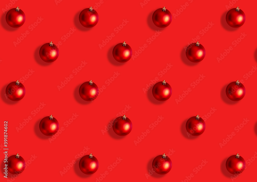 Seamless pattern from large red Christmas balls on a red background. Flat lay