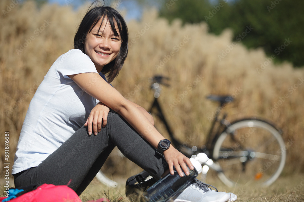 happy smiling woman relaxing in the park happy smiling woman relaxing in the park