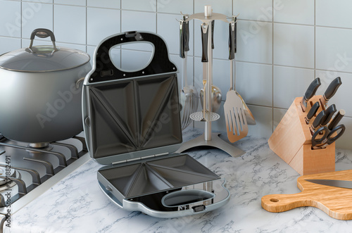 Fotografie Opened sandwich maker on the kitchen table. 3D rendering