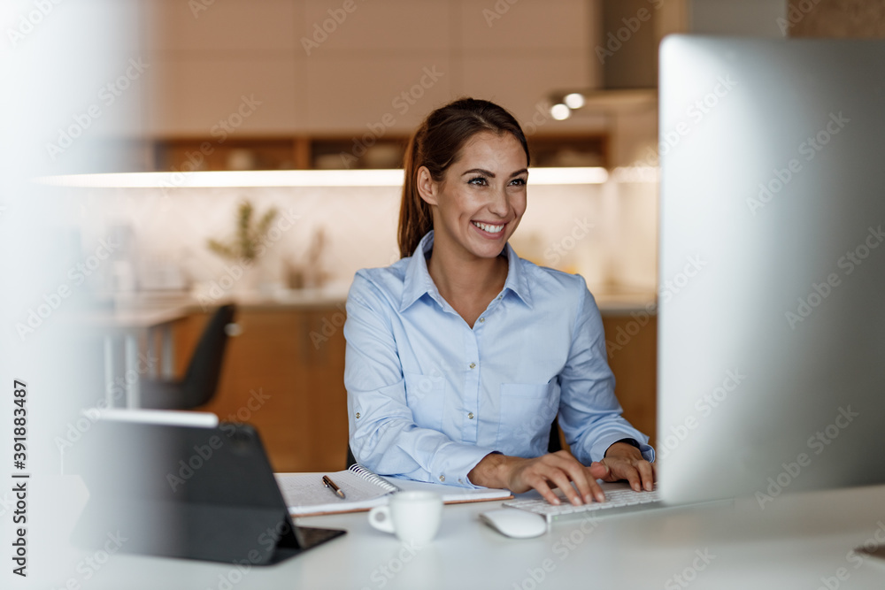 Talking to her colleagues online. Talking to her colleagues online.
