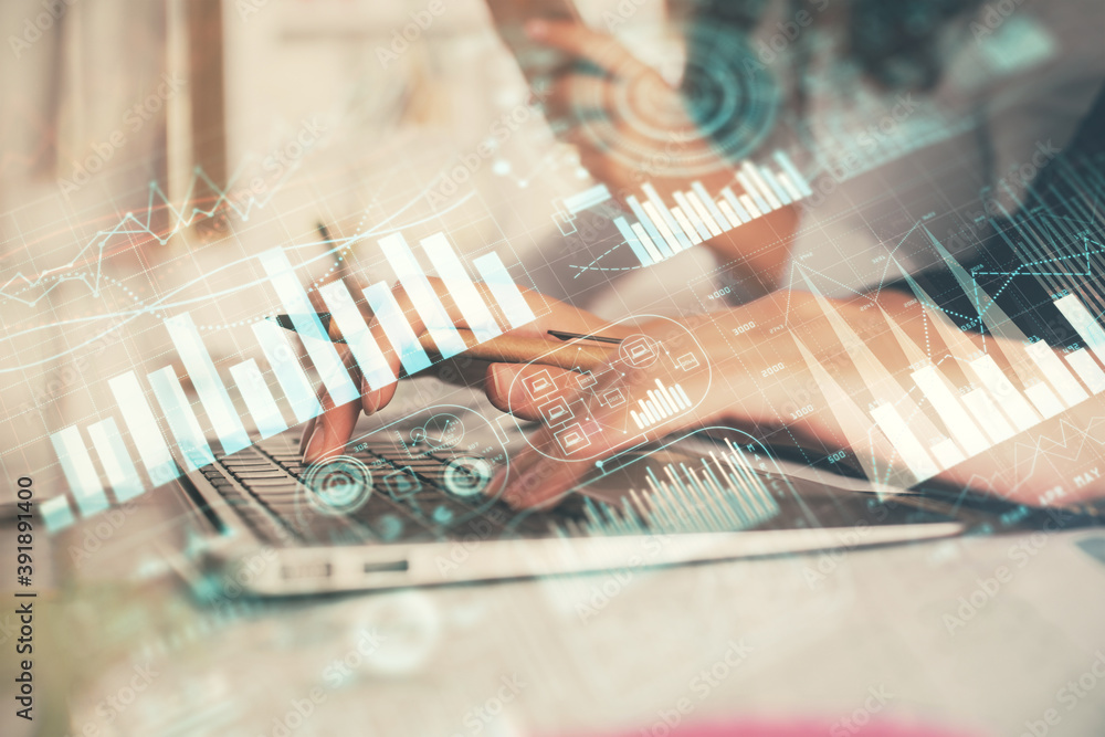 Multi exposure of woman hands typing on computer and financial graph hologram drawing. Stock market analysis concept. Multi exposure of woman hands typing on computer and financial graph hologram drawing. Stock market analysis concept.