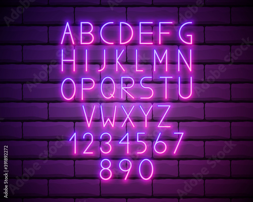 Purple Neon Alphabet Font. Light effect letters, numbers on the brick wall background. Vector typeface for labels, titles, posters etc.