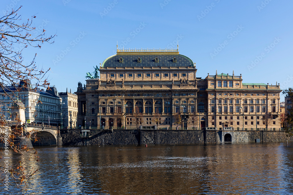 Naklejka premium Autumn Prague Old Town with National Theatre in the sunny Day, Czech Republic
