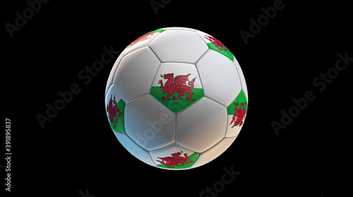 Soccer ball with the flag of Wales on black background. 3d rendering