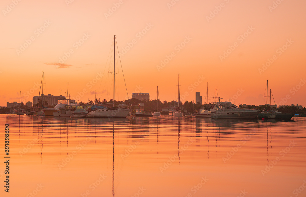 boats at sunset navy sky orange florida 