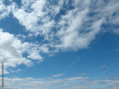 White clouds in the sky in summer