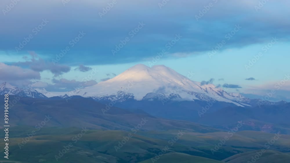 Beautiful view of Mount Elbrus at sunrise, North Caucasus mountains, Russia, zoom out timelapse 4k Beautiful view of Mount Elbrus at sunrise, North Caucasus mountains, Russia, zoom out timelapse 4k