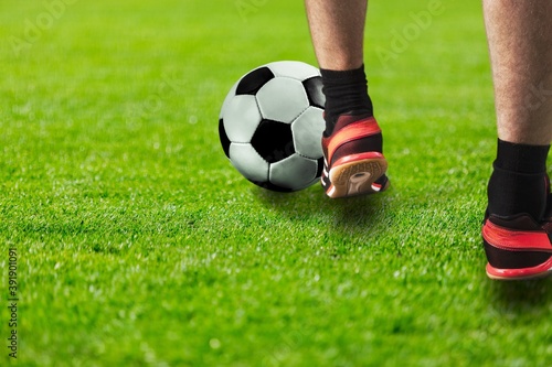 Fototapeta Naklejka Na Ścianę i Meble -  Young sporty man in uniform play soccer