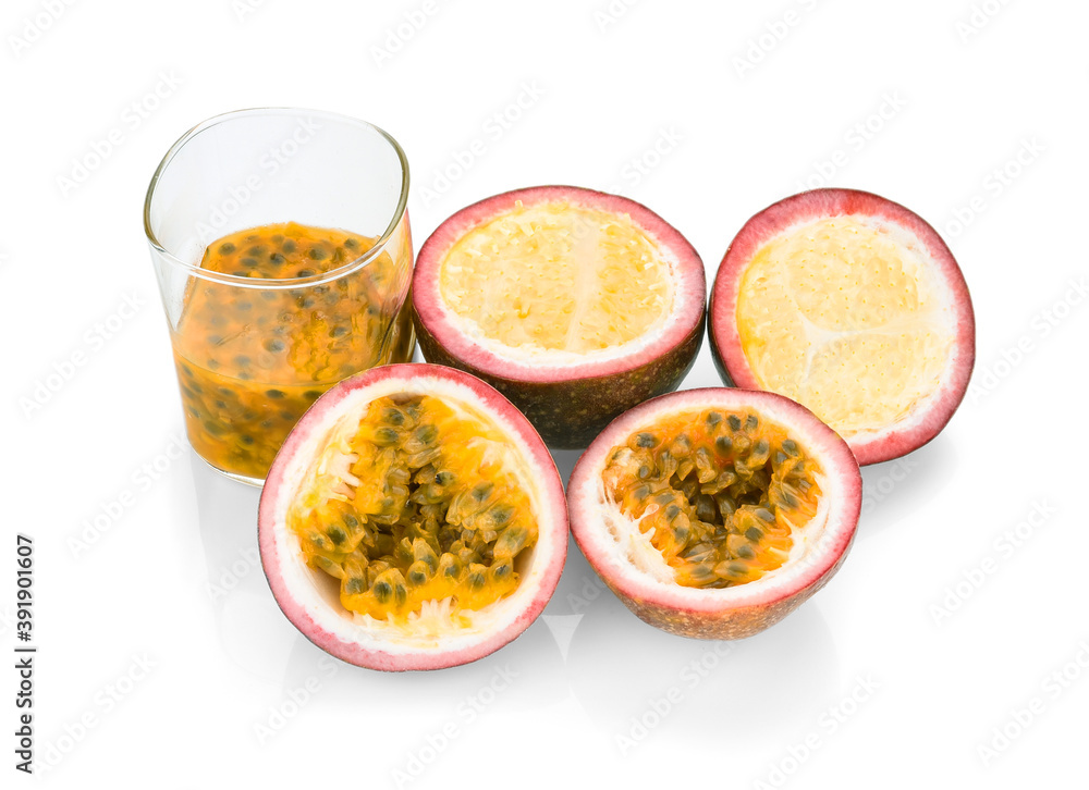 Passion fruits half and juice. Closeup, Select focus. with halfs isolated on white background. Passion fruits half and juice. Closeup, Select focus. with halfs isolated on white background.