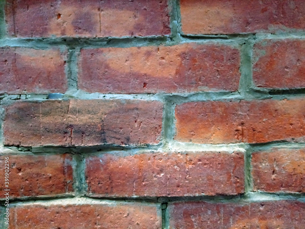 Brown bricks stack layer wall cladding background Brown bricks stack layer wall cladding background