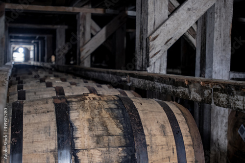 Long Lines of Bourbon Barrels in Racks