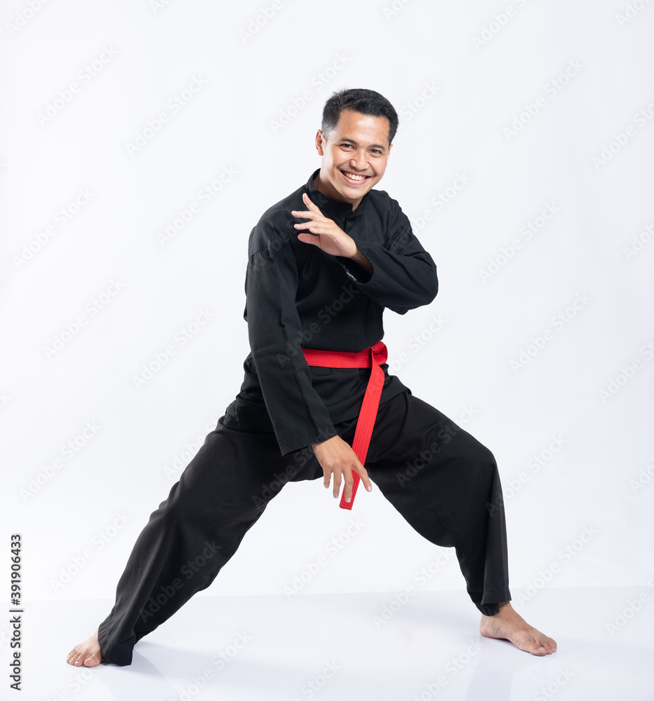 Asian men wear pencak silat sports uniforms to fight on a white background Asian men wear pencak silat sports uniforms to fight on a white background