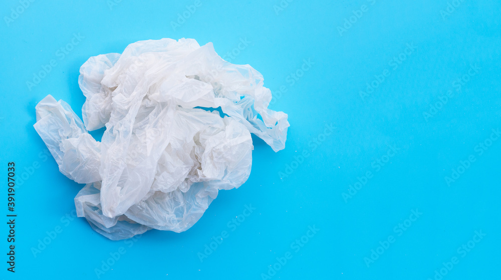 Crumpled plastic bags on blue background. Copy space Crumpled plastic bags on blue background. Copy space
