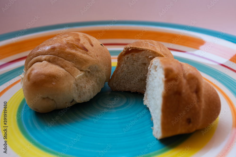 Some cut bread on a plate. Some cut bread on a plate.