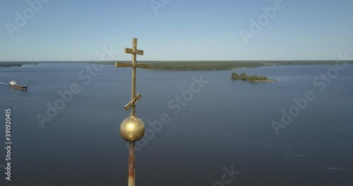 4K high quality aerial video footage of partly submerged Nikolskiy/St. Nicholas Сathedral bell tower off the shore Kalyazin town on great Volga River, Golden Ring route 200 km from Moscow, Russia