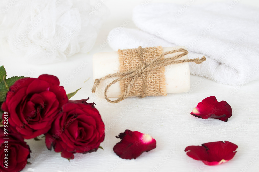 herbal soap spa and terry clothes for health care body skin of lifestyle woman prepare a bath with red rose flower arrangement flat lay style on background white herbal soap spa and terry clothes for health care body skin of lifestyle woman prepare a bath with red rose flower arrangement flat lay style on background white