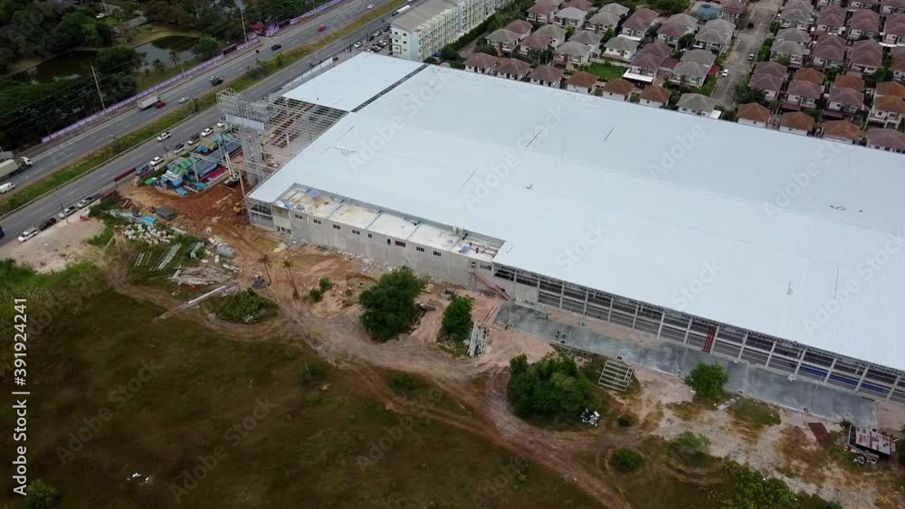 Orbit revealing main building of new superstore construction Thailand Orbit revealing main building of new superstore construction Thailand