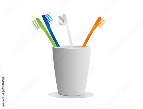 Toothbrush arranged in a ceramic glass