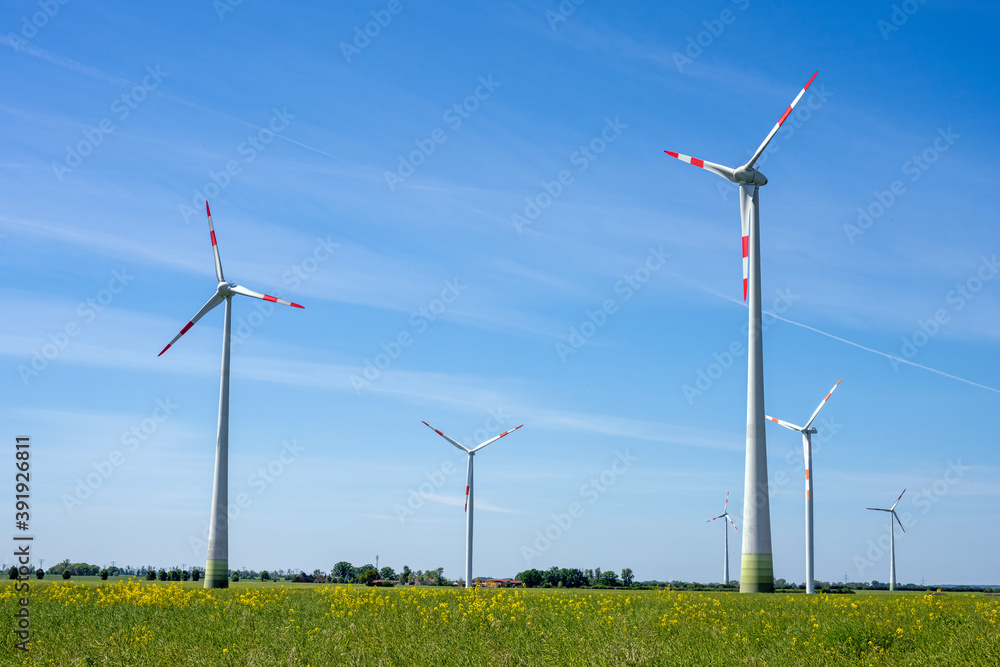 Wind turbines in a rural area in Germany Wind turbines in a rural area in Germany