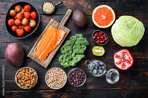 Healthy food and diet concept  top view on dark wooden background