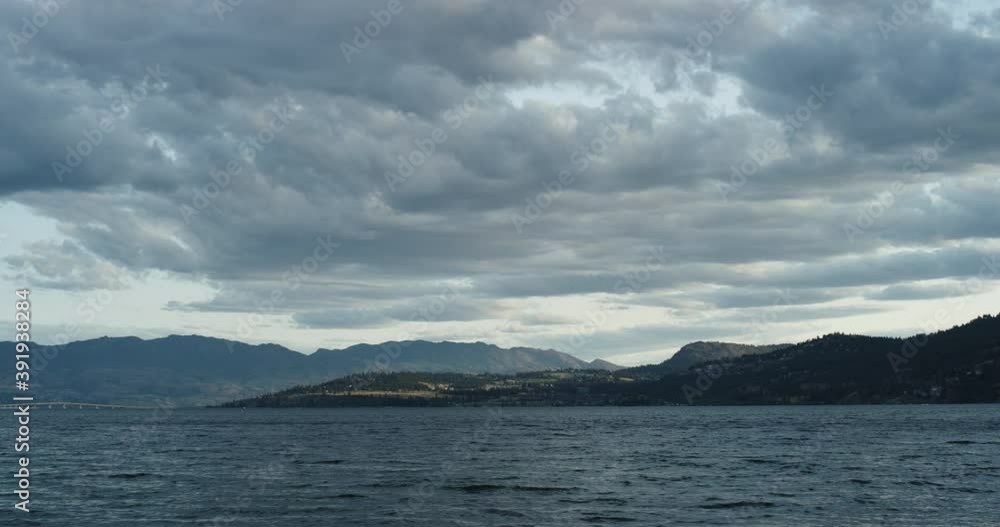 Dark Clouds Over Mountains and Water in the Evening Dark Clouds Over Mountains and Water in the Evening
