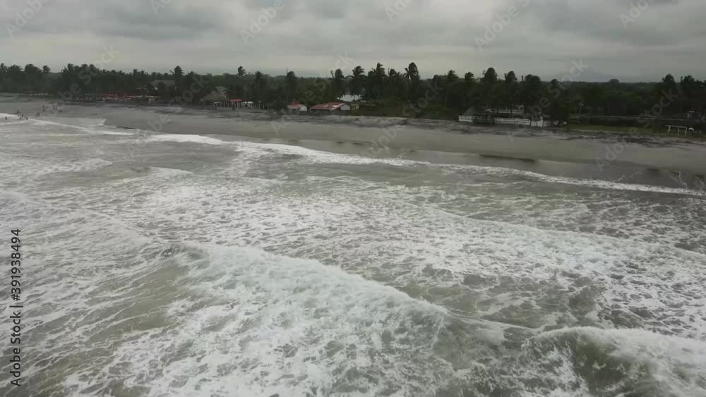Wavy Seascape At Playa Dorada Beach In Sonsonate, El Salvador - aerial drone Wavy Seascape At Playa Dorada Beach In Sonsonate, El Salvador - aerial drone