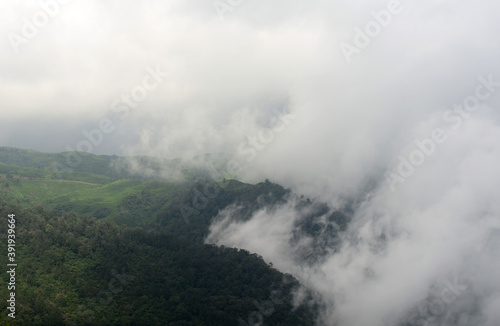 Photo of fog in the middle of the hills. © Kamar Mini
