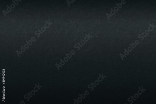 Smooth black concrete wall background
