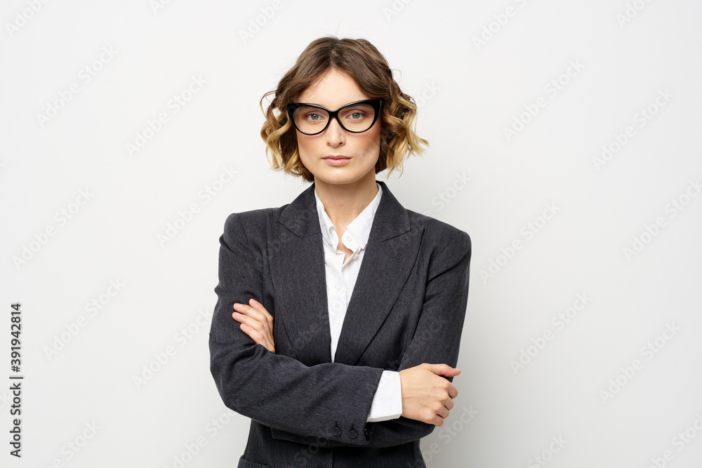 confident business woman in suit gesturing with hands work light background confident business woman in suit gesturing with hands work light background