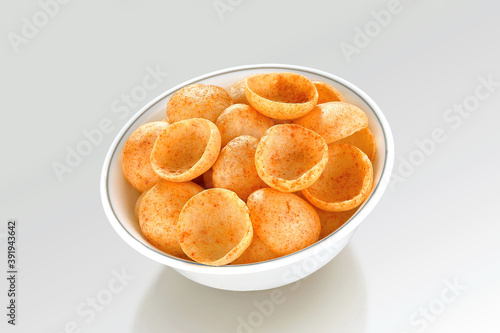 Crispy and crunchy Salty wheat cup & Katori, vatka, moon chips, vatki, fryums or frymus, snack food, Indian Pouch Packing Street Food, selective focus - Image