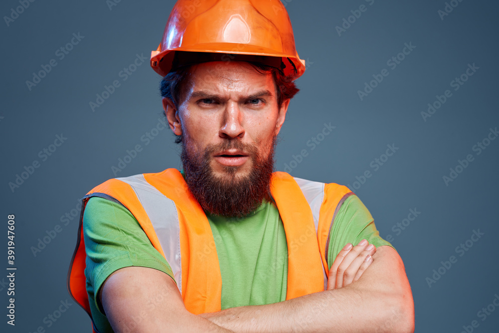 Cropped view of bearded man in working uniform construction engineer Cropped view of bearded man in working uniform construction engineer