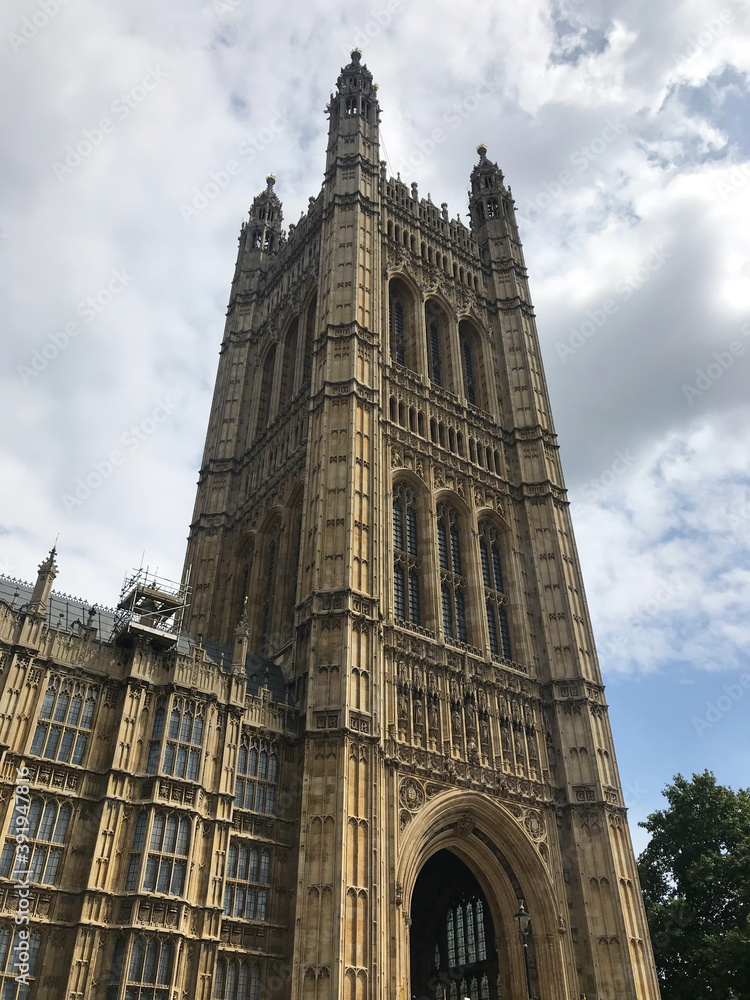 view of Westminster abbey and big ben in London England, UK