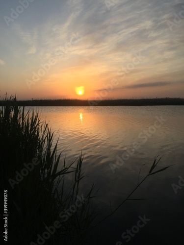 sunset over the river © Artem