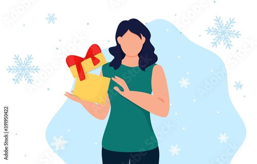 Woman holding gift box. Girl with christmas present.