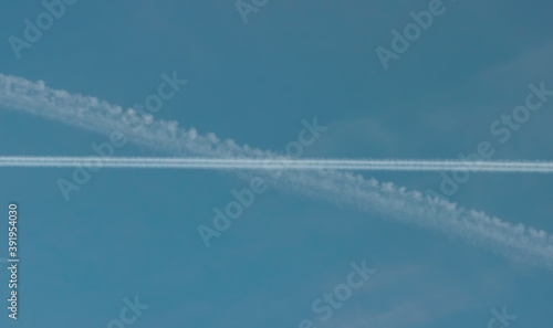 Flight of a cargo plane in the sky. © tangoas
