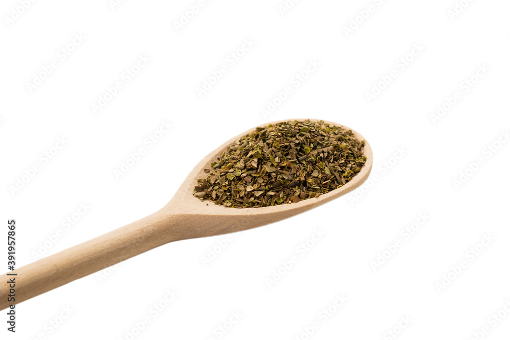 Oregano spice in wooden spoon isolated. Oregano spice in wooden spoon isolated.