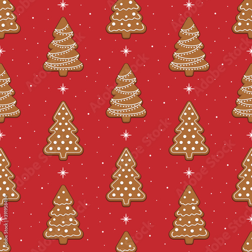Seamless pattern with gingerbread cookies with Christmas trees. Cute Christmas background. © Yulia