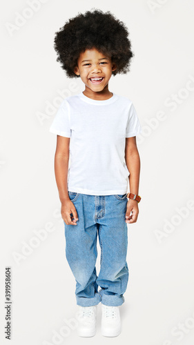 Black boy wearing t-shirt with pants in studio
