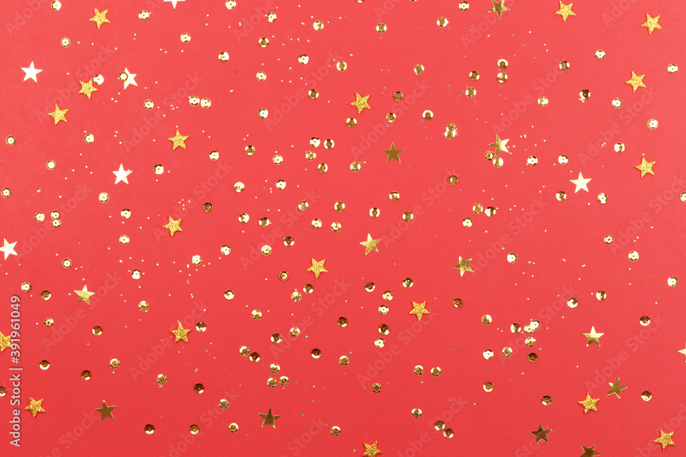 Coral background with glitter and golden stars. Sparkling texture. Festive backdrop for your projects Coral background with glitter and golden stars. Sparkling texture. Festive backdrop for your projects