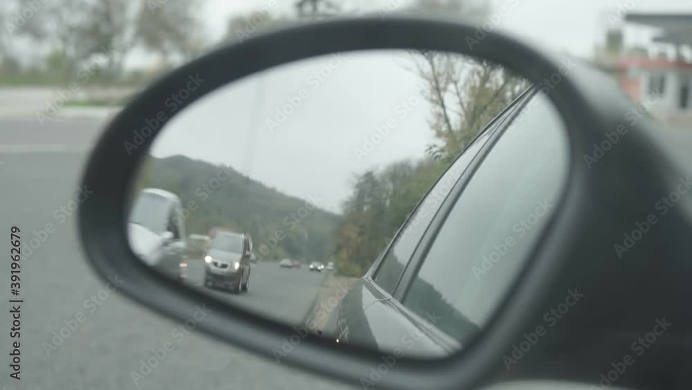 Video shooting view side mirror of a automobile. Video shooting view side mirror of a automobile.