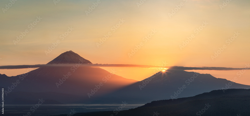 Kamchatka, the beginning of the sun rise on the Avachinsky volcano
