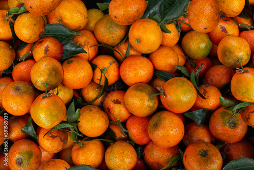 Fresh Mandarin orange with green leaves, High quality photography, top view, Mandarin orange